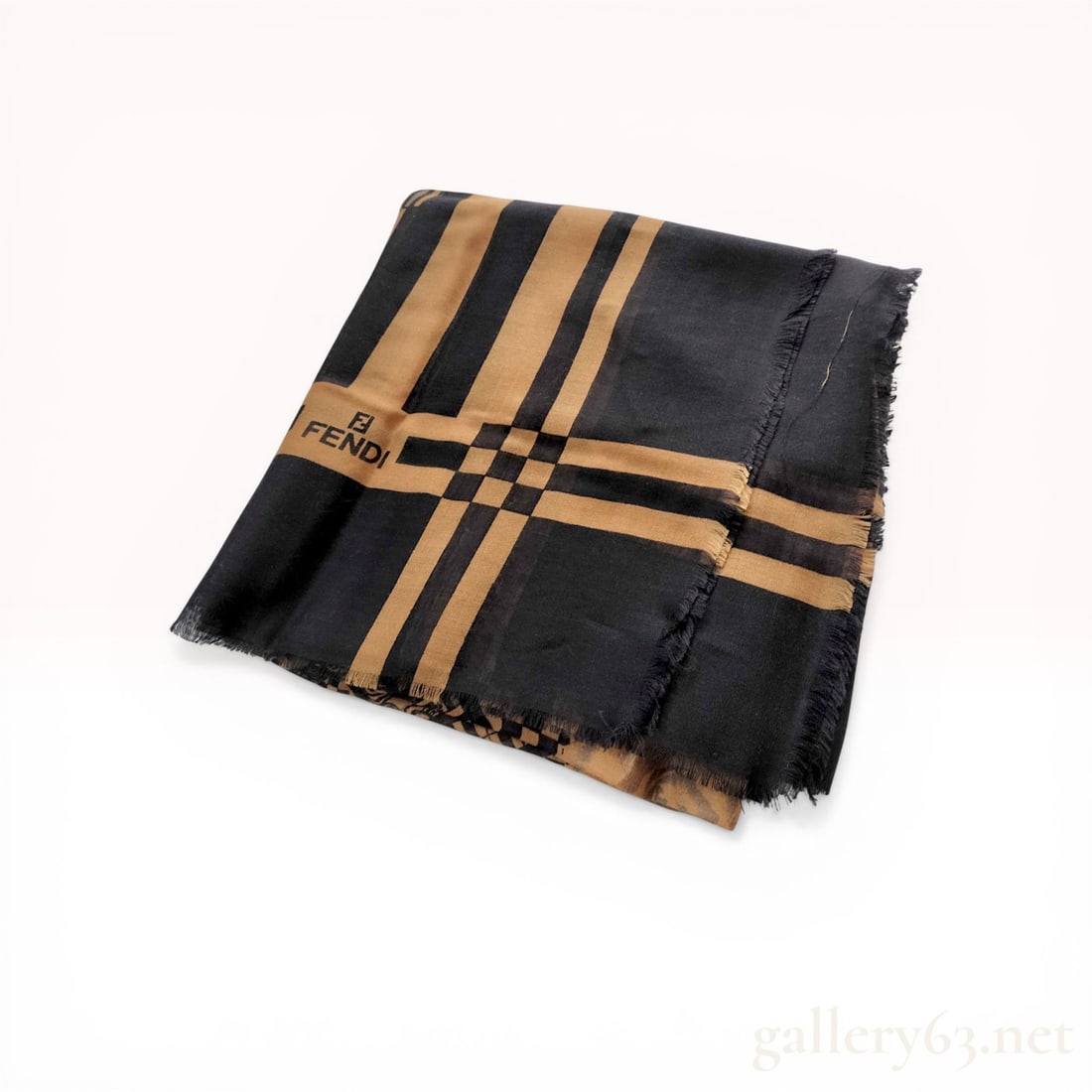 Fendi Multi-Motif Graphic Print Wool Blend Square Scarf: Fendi square scarf featuring an asymmetrical multi-motif graphic print in a black and tan color palette. The design incorporates bold stripes, neoclassical medallions, fashion sketches with script, an