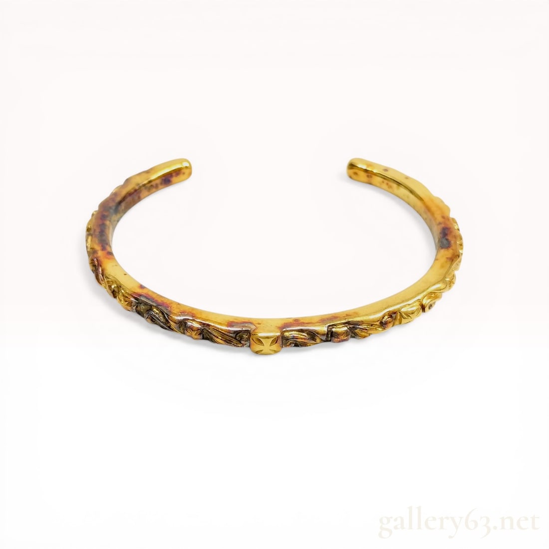 Bill Wall Leather Sterling Silver Gold-Wash Gothic Cross Scrolling Cuff Bracelet: Bill Wall Leather sterling silver cuff bracelet featuring a gold-wash finish and Gothic-inspired design. The exterior is decorated with a continuous relief of scrolling foliate motifs, a central raise
