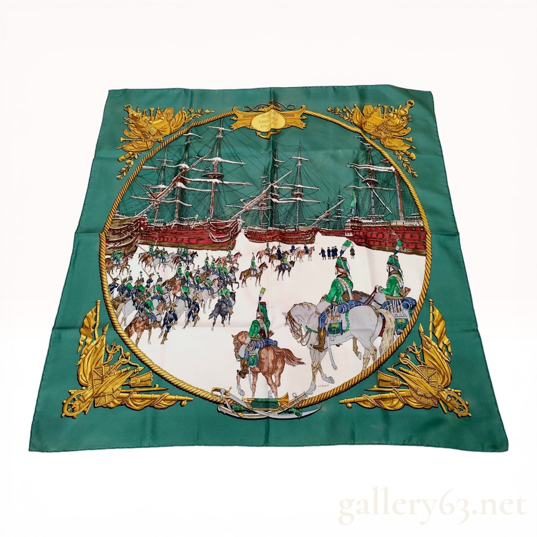 Hermes Marine et Cavalerie Silk Scarf by Philippe Ledoux: Hermes silk twill scarf in the Marine et Cavalerie pattern designed by Philippe Ledoux, first issued in 1966. The design features a central circular scene of hussars on horseback and ships on a frozen
