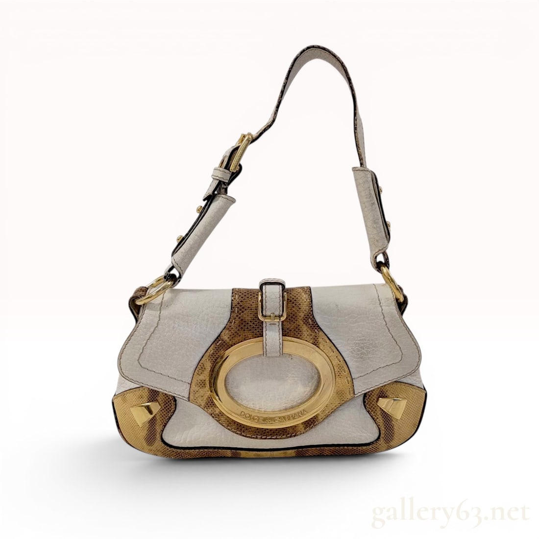 Dolce & Gabbana White Pebbled Leather and Python Trim Flap Shoulder Bag: Dolce & Gabbana flap shoulder bag, made in Italy. Constructed from white pebbled leather with brown python skin accents, featuring a prominent gold-tone oval buckle ornament and adjustable shoulde