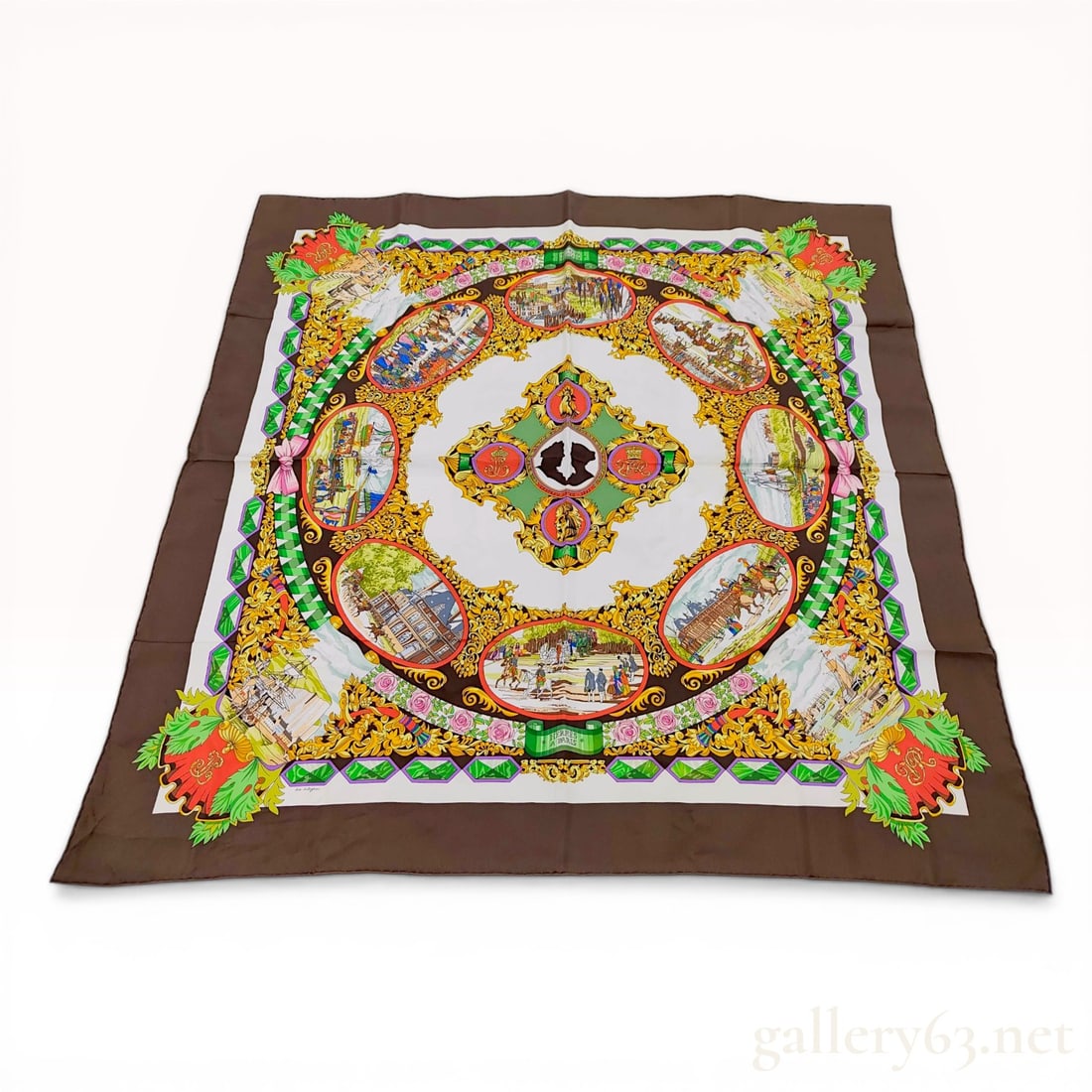 Hermes L'Entente Cordiale Silk Twill Scarf: Hermes silk twill scarf in the L'Entente Cordiale pattern, first designed by Loic Dubigeon in 1994. The design features a chocolate brown border and white field with historical vignettes, gold rococo 