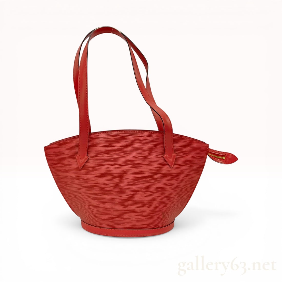 Louis Vuitton Red Epi Leather Saint Jacques Shopping Bag: Louis Vuitton Saint Jacques Shopping shoulder bag in Castillan Red Epi leather, late 20th century. This piece features a flared silhouette with a top zip closure, long flat leather shoulder straps, an