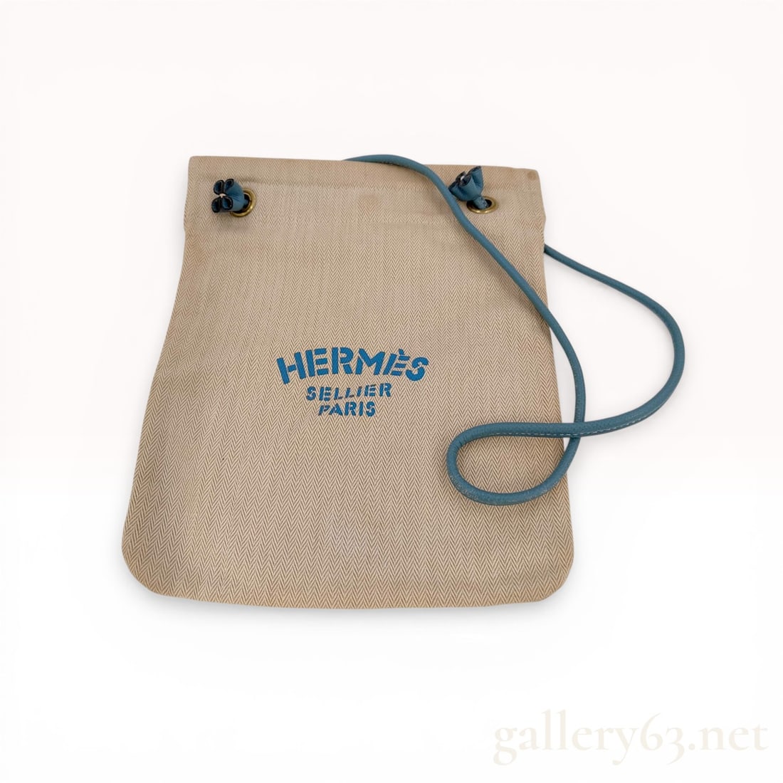 Hermes Aline PM Sellier Canvas Grooming Bag: Hermès Aline PM Sellier grooming bag, late 20th to early 21st century. Constructed from natural herringbone woven canvas, the bag features a blue printed logo on the front and a blue leather sh