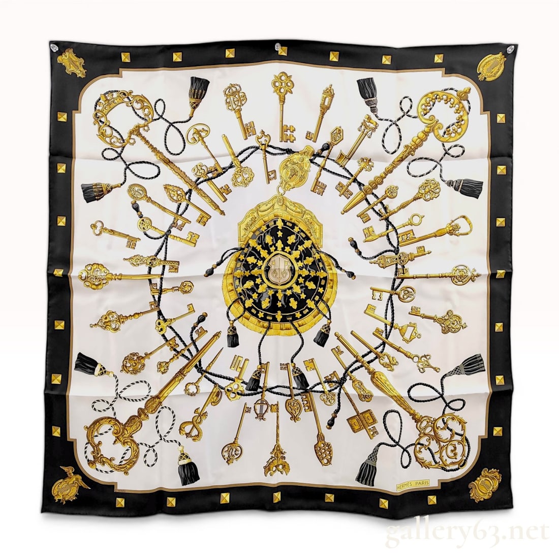 Hermes Les Clefs Silk Carre 90 Scarf: Hermes silk carre scarf in the iconic Les Clefs (The Keys) pattern designed by Caty Latham. The screen-printed 100% silk features a central ornate purse surrounded by a radial arrangement of antique k