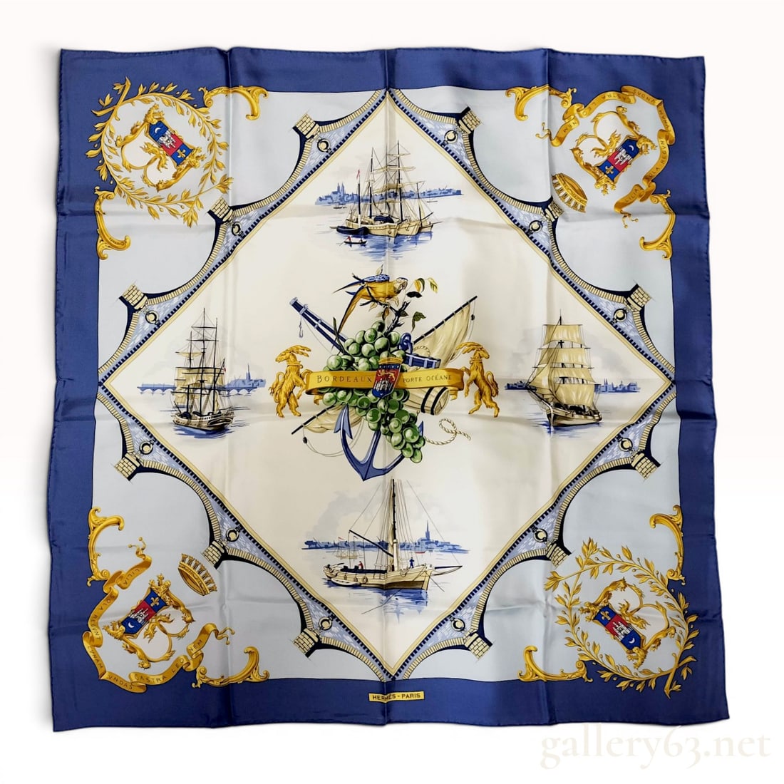 Hermes Bordeaux Porte Oceane Silk Carre Scarf: Hermès silk twill scarf in the Bordeaux Porte Océane pattern, originally designed by Loïc Dubigeon. The maritime design features a central grape and anchor motif surrounded by four 