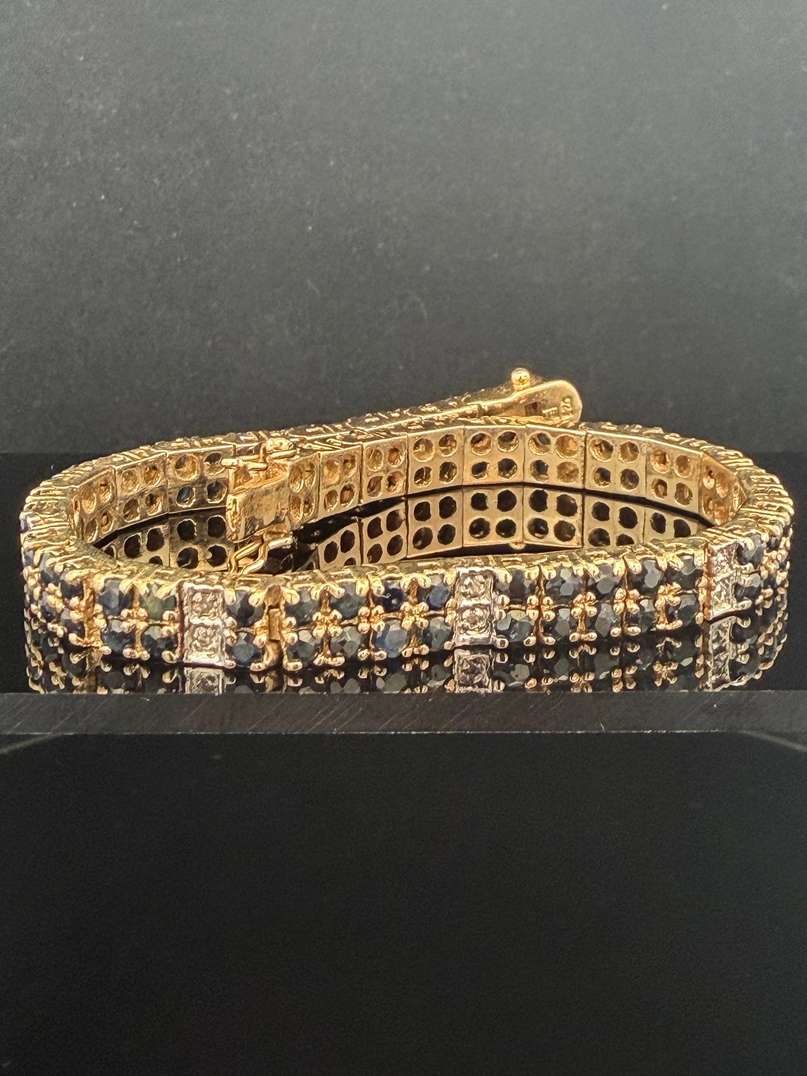 Estate Gilt Silver Natural Sapphire and Diamond Tennis Bracelet: Approx 1.50cttw gems 7 inches long 19.6 grams good condition.