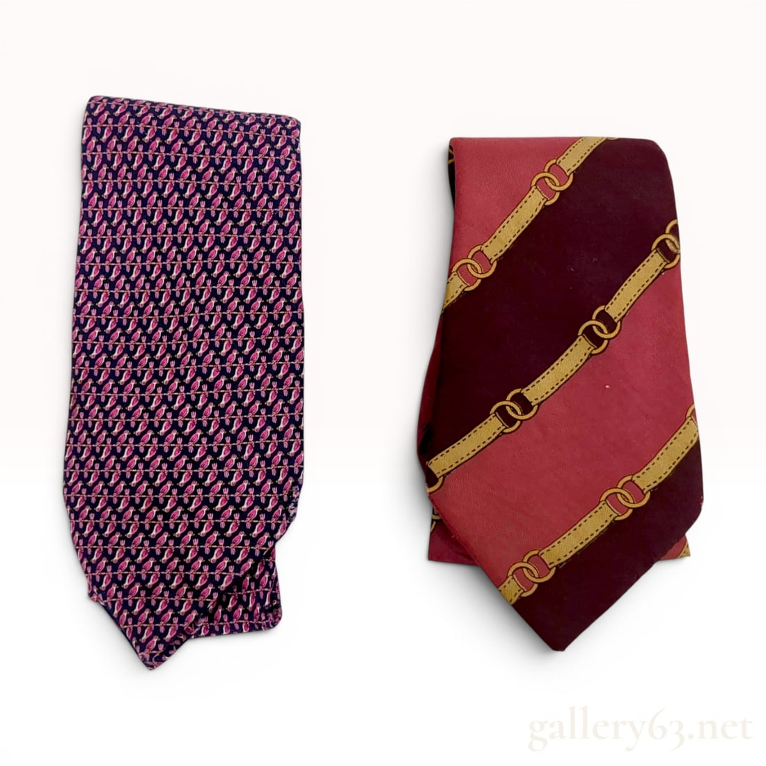 Two Silk Designer Neckties including Herm?¨s Paris: This lot consists of two silk neckties. The first item is an authentic Hermès Paris necktie made from 100 percent silk. The pattern features a repeating miniature motif of pink and white parrot