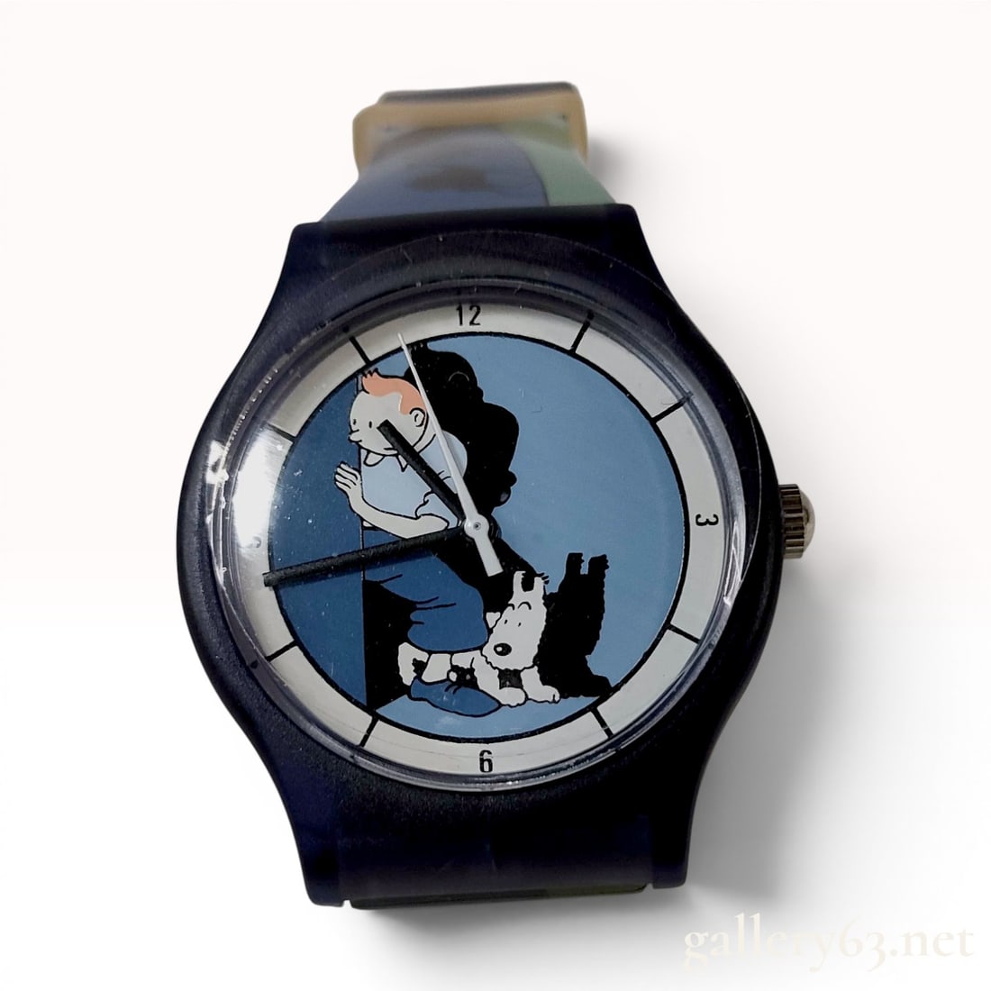 1994 Moulinsart Tintin Limited Edition Character Wristwatch: This Tintin character wristwatch was produced by Moulinsart in 1994 as part of a limited edition series. The timepiece features a translucent blue plastic case and a white chapter ring with black mark