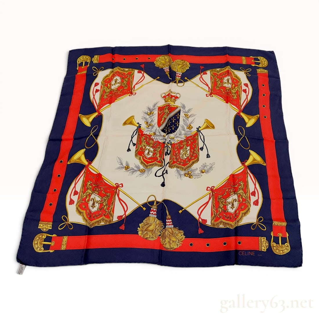 Celine Paris Heraldic Motif Silk Square Scarf: A vintage Celine silk square scarf featuring a complex heraldic and military-inspired motif. The design centers on a regal coat of arms topped with a crown, displaying a shield with fleurs-de-lis and 