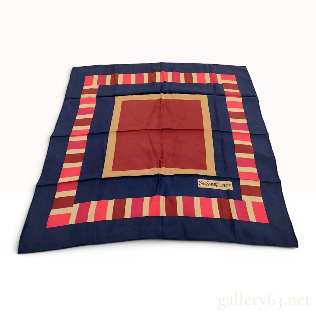 Yves Saint Laurent Vintage Silk Scarf with Geometric Block Pattern: Yves Saint Laurent vintage silk square scarf, late 20th century. Geometric block design featuring a burgundy center and multicolor striped borders in a fine silk twill weave with hand-rolled edges. Fe