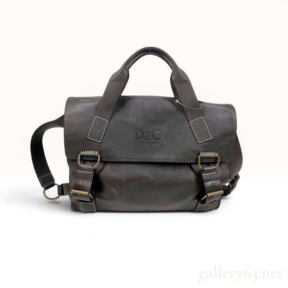 D&G Dolce & Gabbana Brown Leather Messenger Bag with Buckle Closures: A D&G Dolce & Gabbana messenger-style satchel bag crafted from dark brown leather featuring contrasting cream topstitching throughout. The front flap is embossed with the D&G logo and Dolce & Gabbana 