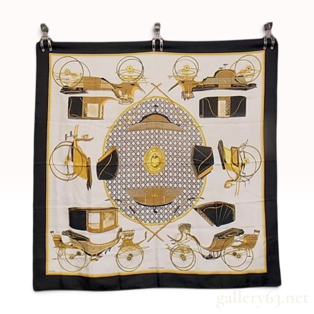 Hermes Les Voitures a Transformation Silk Scarf: Hermes silk scarf in the Les Voitures a Transformation pattern, designed by Francoise de la Perriere. The composition features various illustrations of horse-drawn carriages, their frames, wheels, and
