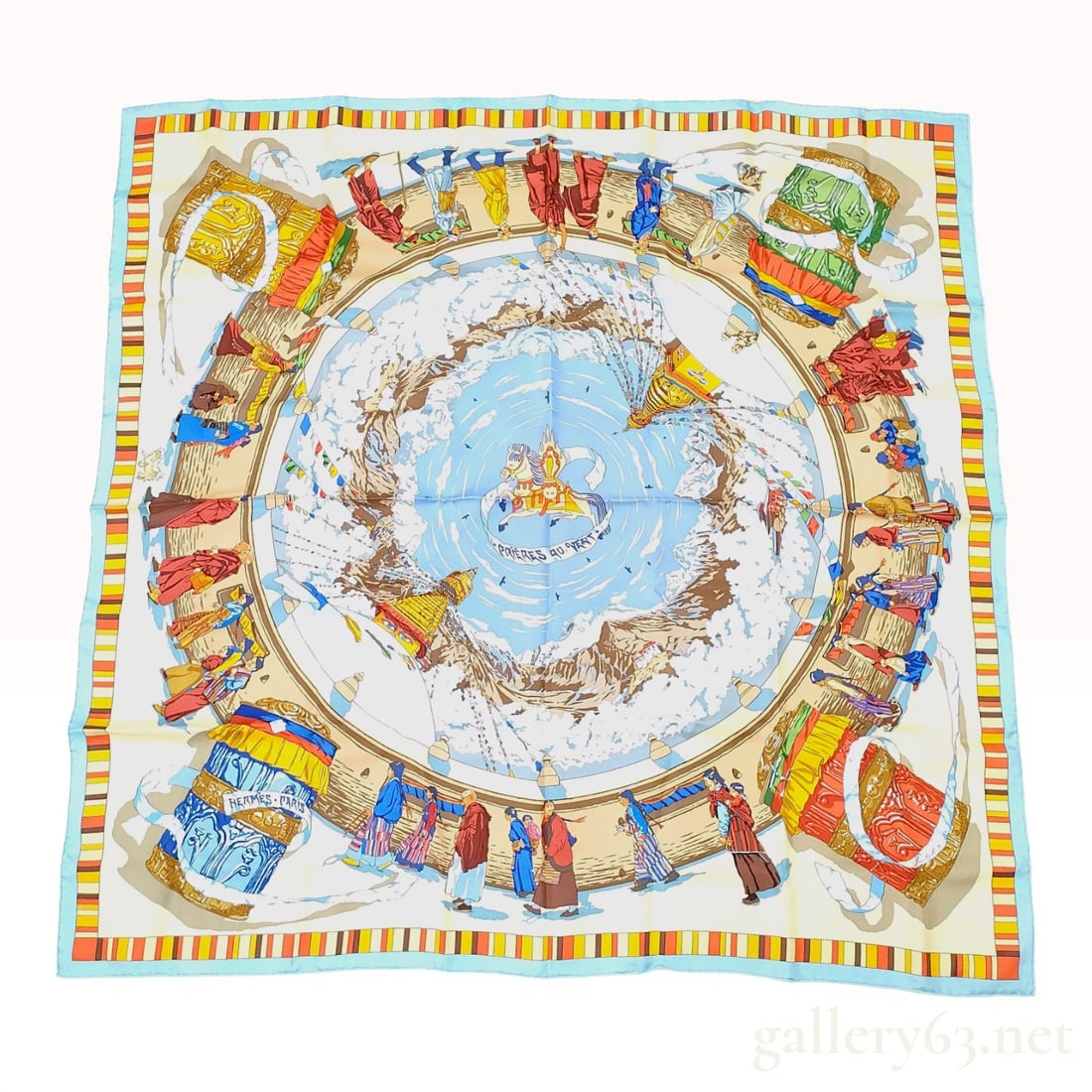 Hermes Silk Scarf Prieres au Vent by Dimitri Rybaltchenko: This Hermes silk scarf features the Prieres au Vent pattern designed by Dimitri Rybaltchenko. The design centers on a Wind Horse (Lungta) carrying a banner that reads PRIERES AU VENT. The circular com