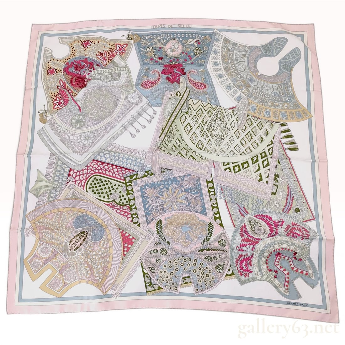 Hermes Tapis de Selle 90 Silk Scarf with Box: This authentic Hermes silk twill scarf features the Tapis de Selle (Saddle Pads) pattern, designed by artist Annie Faivre. The intricate equestrian-themed design depicts an array of decorative saddle 