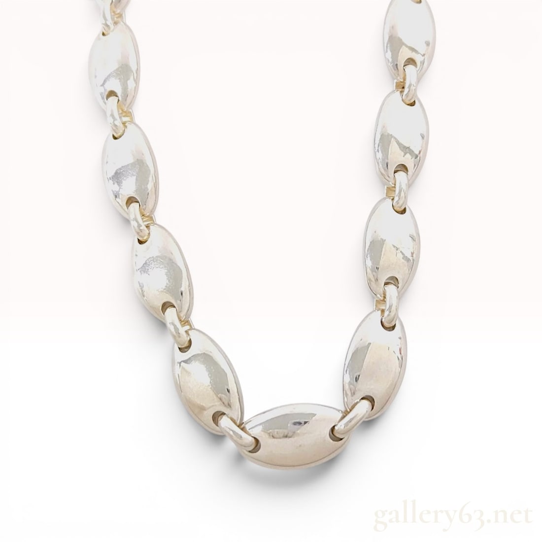 Tiffany & Co. Pebble Link Chain 104.5g Necklace: Tiffany & Co. sterling silver necklace from the Pebble collection. This piece features a series of puffed, oval pebble-style links, each domed on the front and slightly concave on the reverse, joined 