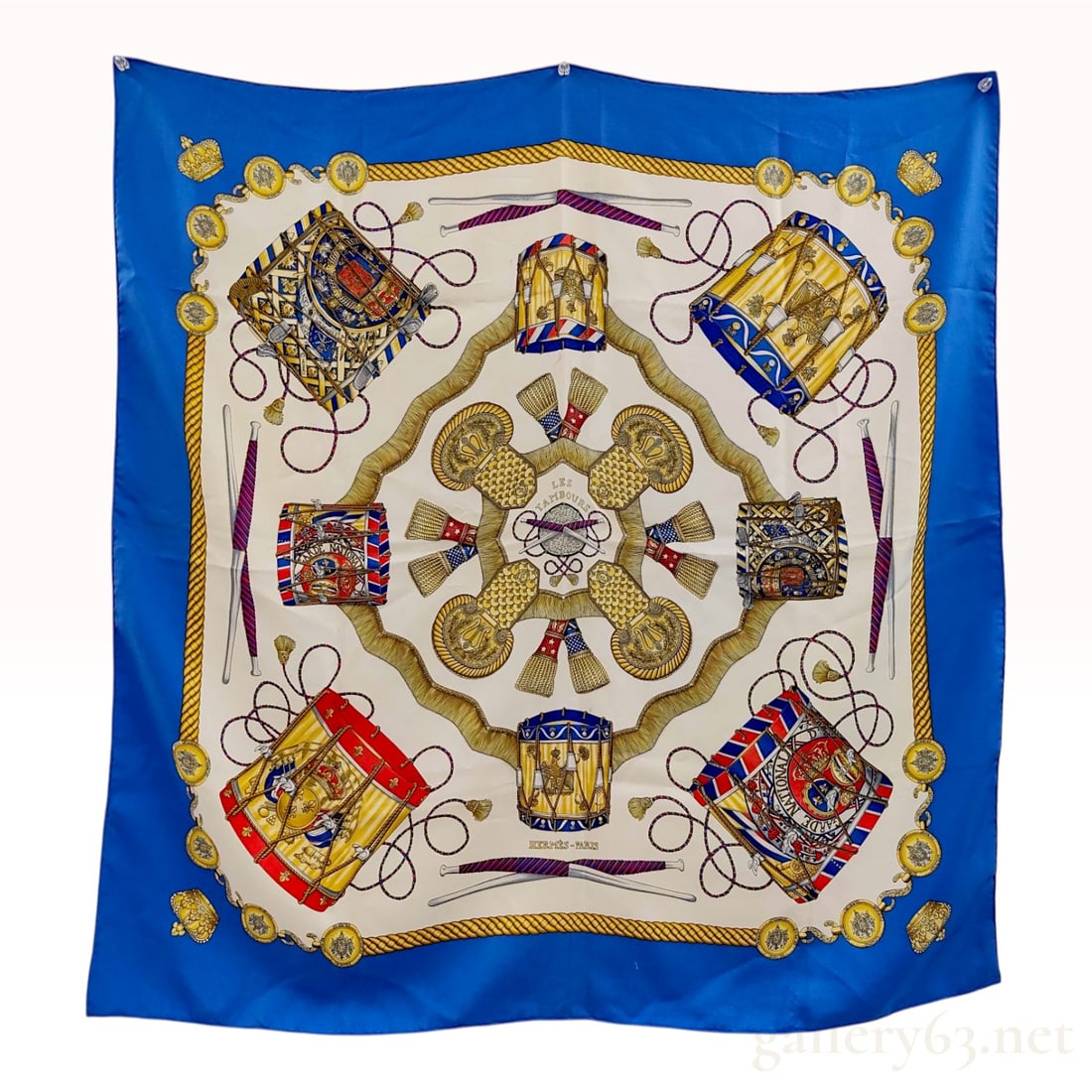 Hermes Les Tambours Silk Scarf designed by Joachim Metz: This is a silk twill scarf from Hermes featuring the Les Tambours (The Drums) pattern designed by Joachim Metz, originally issued in 1989. The design depicts various 18th and 19th-century regimental d