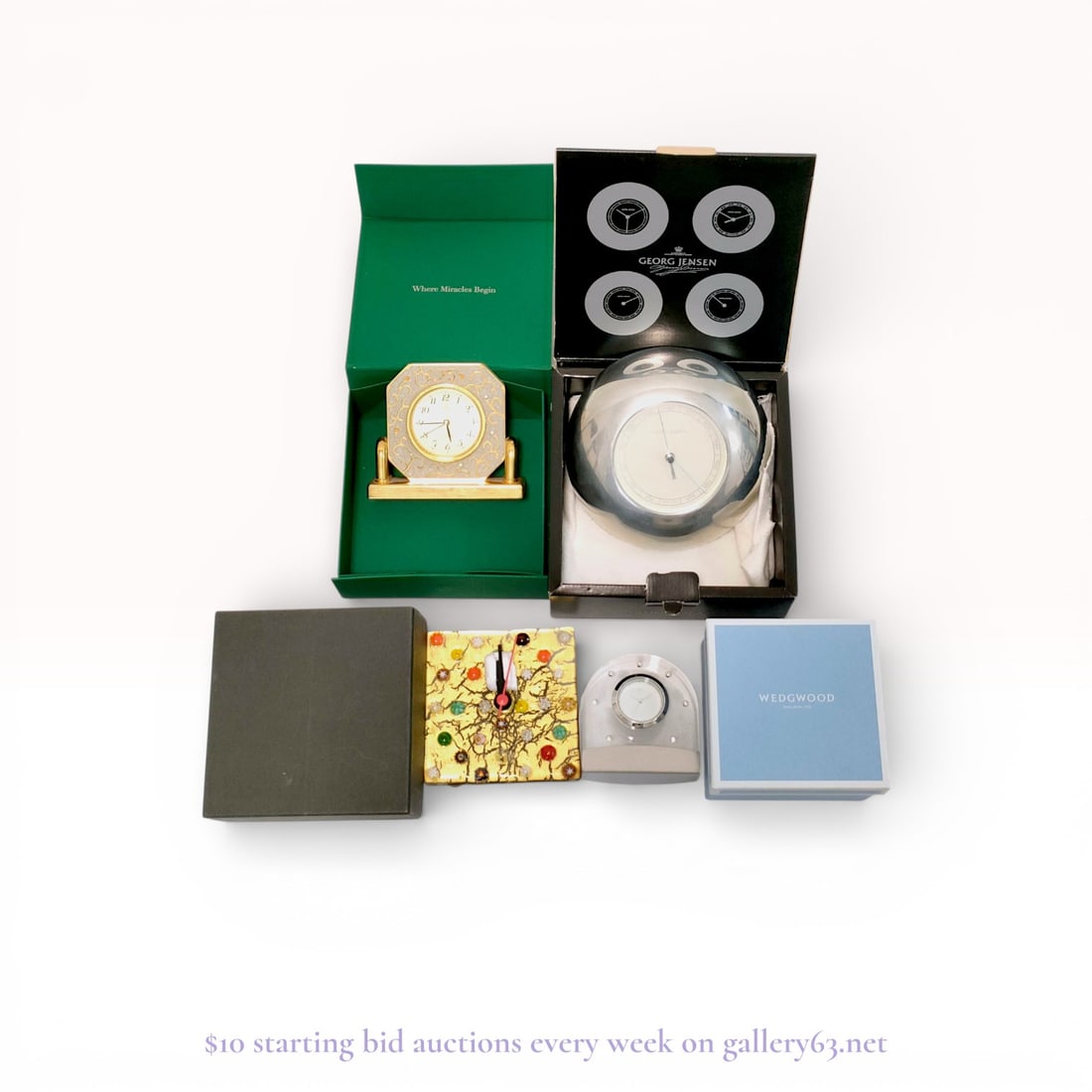 Mikimoto, Georg Jensen, and Wedgwood Group of Desk Clocks and Barometer: This collection features four decorative timepieces and one scientific instrument from prestigious luxury makers. The Mikimoto International mantel clock features a quartz movement within a gold-toned