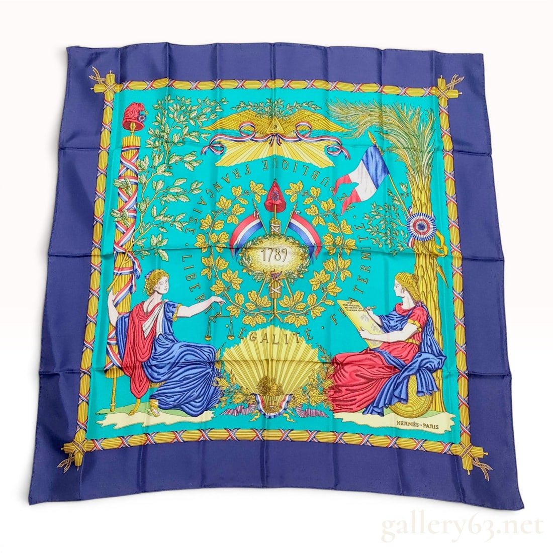 Hermes Republique Francaise Liberte Egalite Fraternite Silk Scarf: This is an authentic Hermes 100% silk twill scarf featuring the Republique Francaise design, also commonly known as Liberte Egalite Fraternite, created by artist Joachim Metz. Originally issued in 198