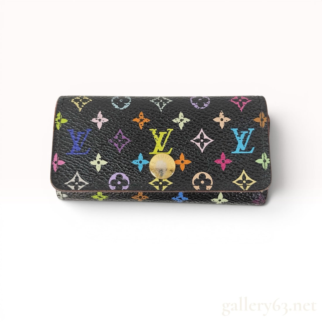 Louis Vuitton Monogram Multicolore Multicles 4 Key Holder: Louis Vuitton Monogram Multicolore Multicles 4 Key Holder, designed in collaboration with Takashi Murakami. Coated canvas exterior with a multicolored monogram pattern and a pink cross-grain leather i