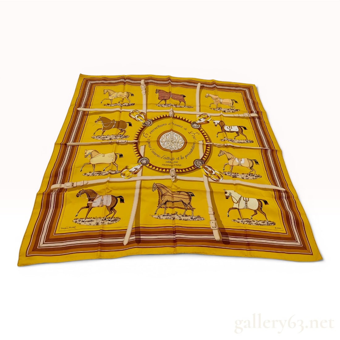 Hermes Couvertures et tenues de Jour Silk Scarf: A vintage Hermes silk twill square scarf featuring the Couvertures et tenues de Jour (Stable blankets and day wear) pattern, originally designed by Jacques Eudel in 1974. The scarf is rendered on a mu