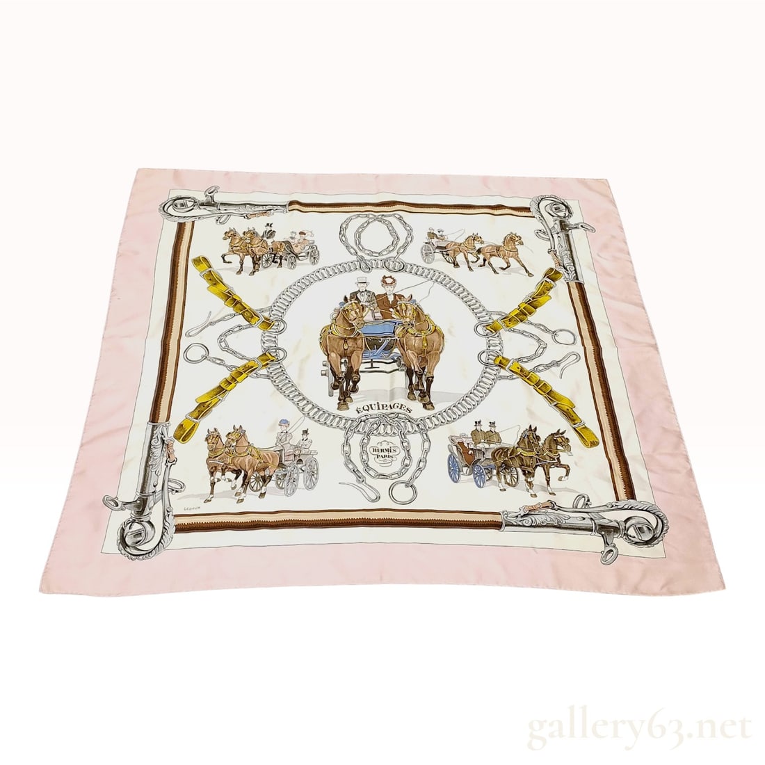 Hermes Equipages Silk Twill Scarf: This is a silk twill scarf produced by Hermes titled Equipages and designed by artist Philippe Ledoux. The design features a classic equestrian theme depicting various detailed 19th-century horse-draw