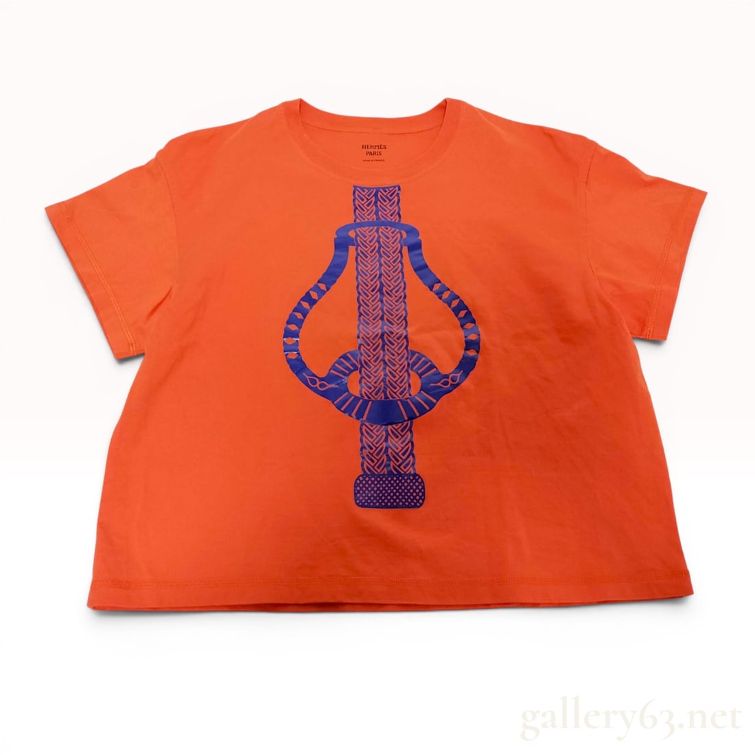 Hermes Fantaisie d'Etriers Orange Cotton Graphic T-Shirt, Size 38: A short-sleeved, crew-neck t-shirt by Hermes featuring the Fantaisie d'Etriers (Stirrup Fantasy) design. The garment is made from 100% orange cotton and features dark blue screen-printed graphics on t