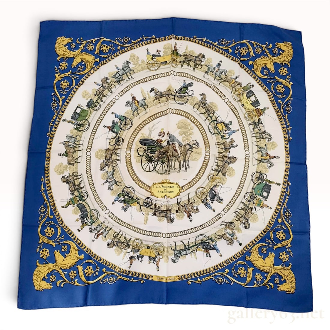 Hermes La Promenade de Longchamps Silk Scarf by Philippe Ledoux: A vintage Hermes 90cm silk twill scarf featuring the La Promenade de Longchamps pattern, designed by artist Philippe Ledoux. The composition centers on a circular medallion showing a gentleman on hors