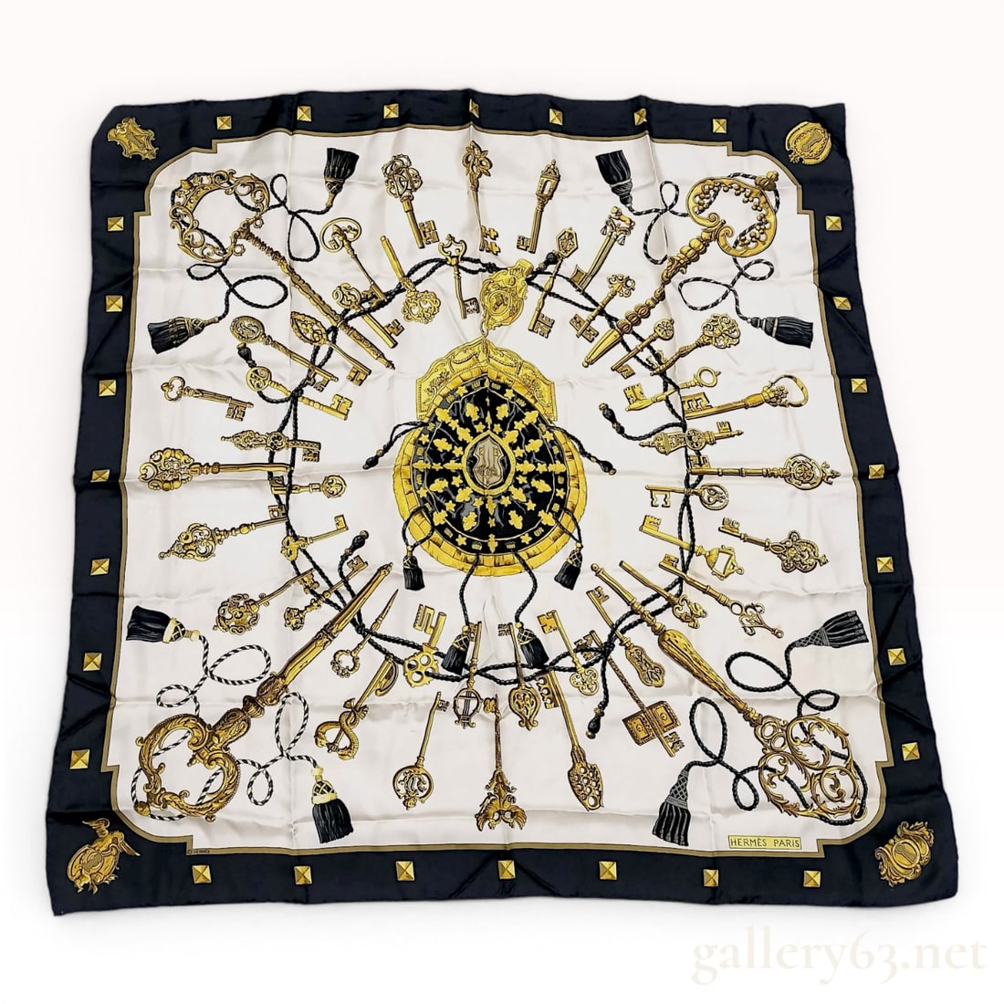 Hermes Silk Scarf in Les Cles Pattern by Caty Latham: A Hermes silk twill scarf featuring the Les Cles (The Keys) pattern, originally designed by Caty Latham. The design centers on an ornate medallion with a radial arrangement of various antique-style ke