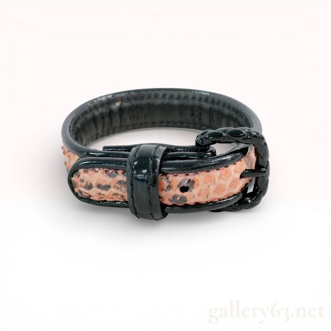 Bottega Veneta Black Leather and Snakeskin Buckle Bracelet: Bottega Veneta buckle-style strap bracelet, size XS. Crafted from black leather with a central natural snakeskin inlay featuring tan and pink tones with dark spotted markings. The black coated metal b