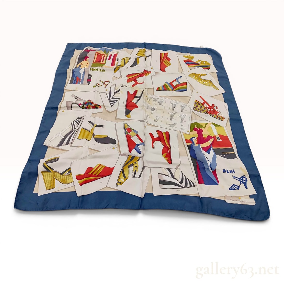 Salvatore Ferragamo Silk Scarf with Archival Shoe Design Motif: A silk scarf by Salvatore Ferragamo featuring a collage design known as the history of the shoe. The central pattern displays various archival sketches and technical illustrations of footwear from the
