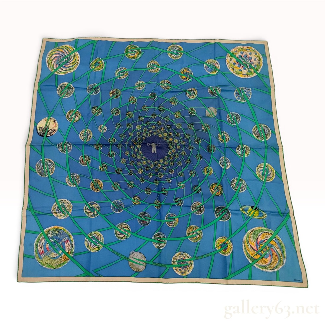 Hermes Les Feux de l'Espace 90cm Silk Carre Scarf: An Hermes 90cm silk carre scarf featuring the Les Feux de l'Espace (The Fires of Space) design by artist Loic Dubigeon, originally issued in 1987 to commemorate the 150th anniversary of the house of H