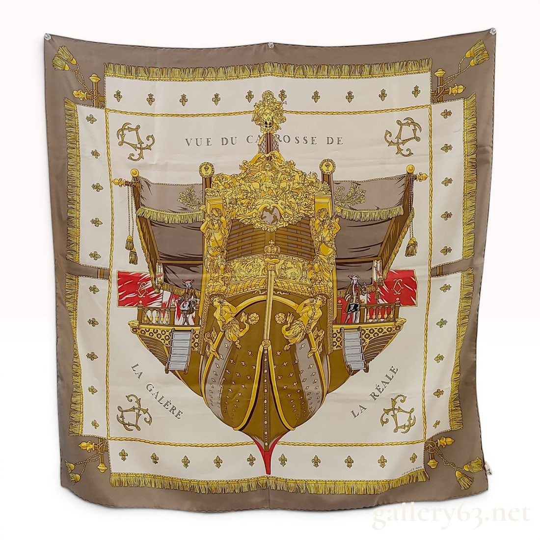 Hermes Silk Scarf Vue du Carrosse de la Galere La Reale: A vintage Hermes silk scarf in the Vue du Carrosse de la Galere La Reale pattern, a 1953 design by artist Hugo Grygkar. The central illustration depicts the ornate, gilded stern of the seventeenth-cen