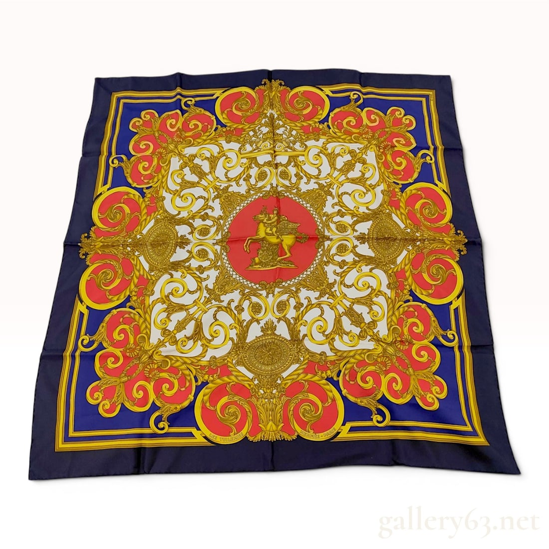 Hermes Silk Twill Carre 90 Scarf Les Tuileries by Joachim Metz: A Hermes silk twill scarf featuring the Les Tuileries pattern, designed by Joachim Metz and first issued in 1990. The design depicts ornate decorative motifs inspired by the Tuileries Garden in Paris,