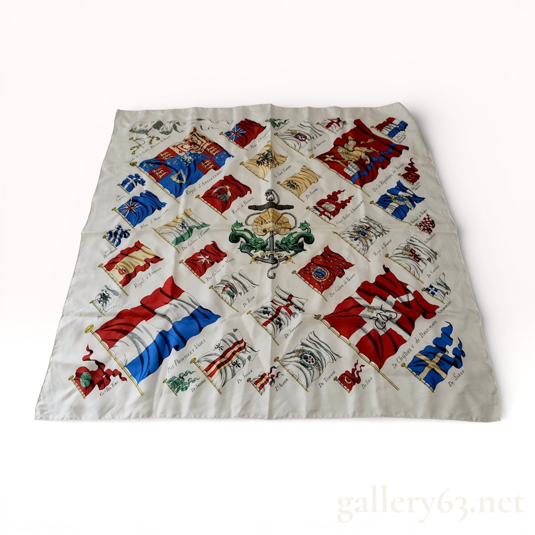 Hermes Pavois Silk Scarf Designed by Philippe Ledoux: Hermes silk twill scarf in the Pavois pattern, originally designed by Philippe Ledoux in 1964. The maritime-themed design features a central anchor and shell motif surrounded by various historical nav