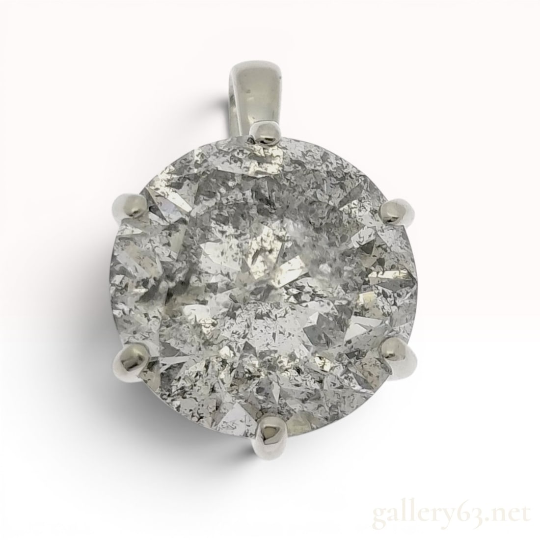 2.00 Carat Salt and Pepper Diamond and Platinum Pendant: This platinum pendant features a central round brilliant cut salt and pepper diamond. The gemstone is characterized by dense, naturally occurring black and white internal inclusions that give the ston