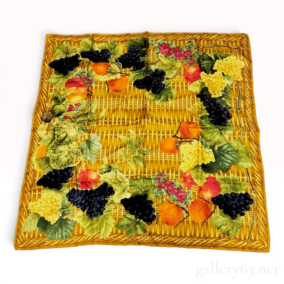Gucci Silk Cesto di Frutta Pattern Carre 90: Gucci silk twill carre 90 Cesto di Frutta (Basket of Fruit) pattern, late 20th century. The design features a yellow trompe l'oeil wicker basketweave background decorated with grapes, pomegranates, an
