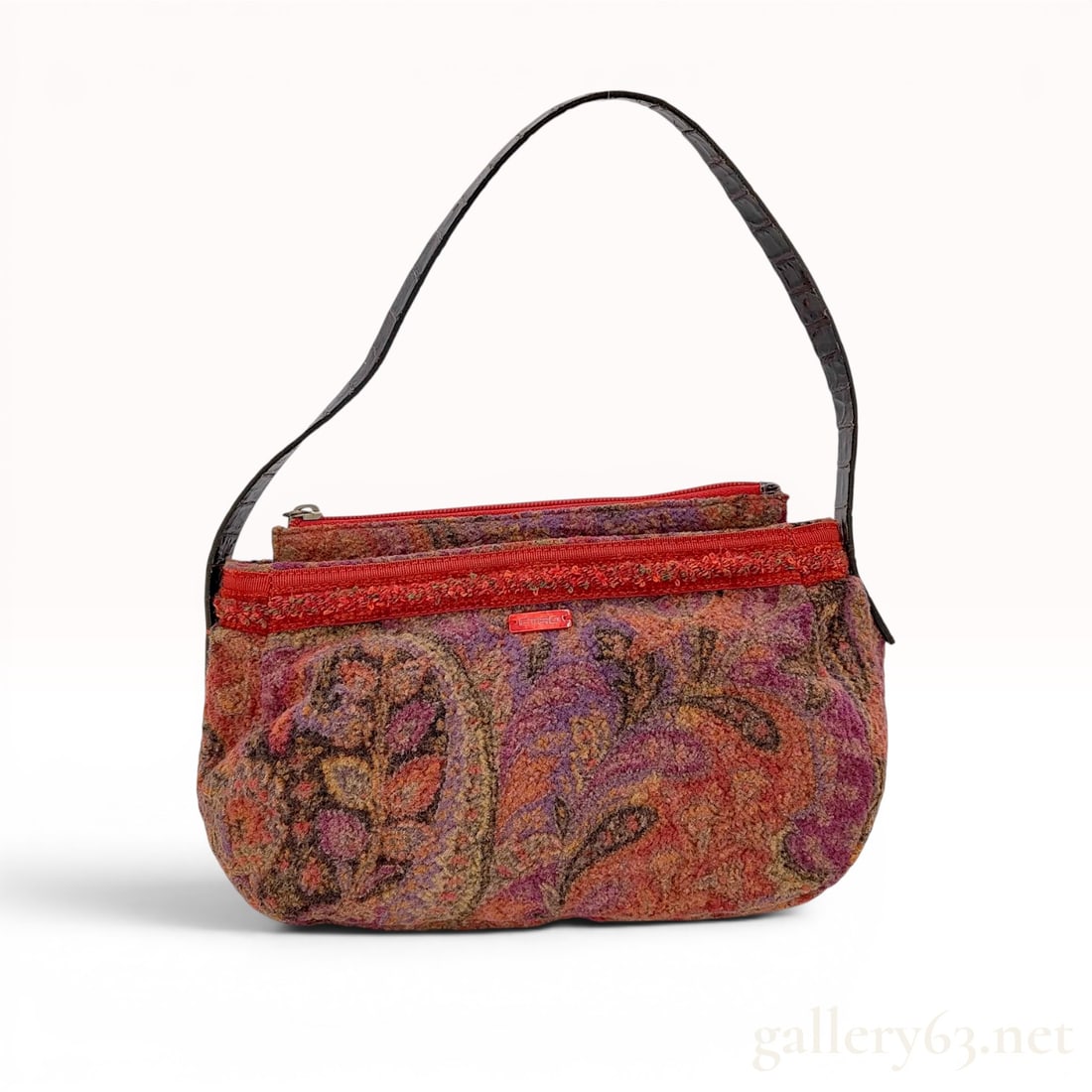 Etro Multicolored Paisley Pattern Wool Shoulder Bag: Etro baguette-style shoulder bag featuring a signature multicolor paisley motif. The exterior is crafted from a textured wool-blend fabric with a black crocodile-embossed leather strap and a bright pu