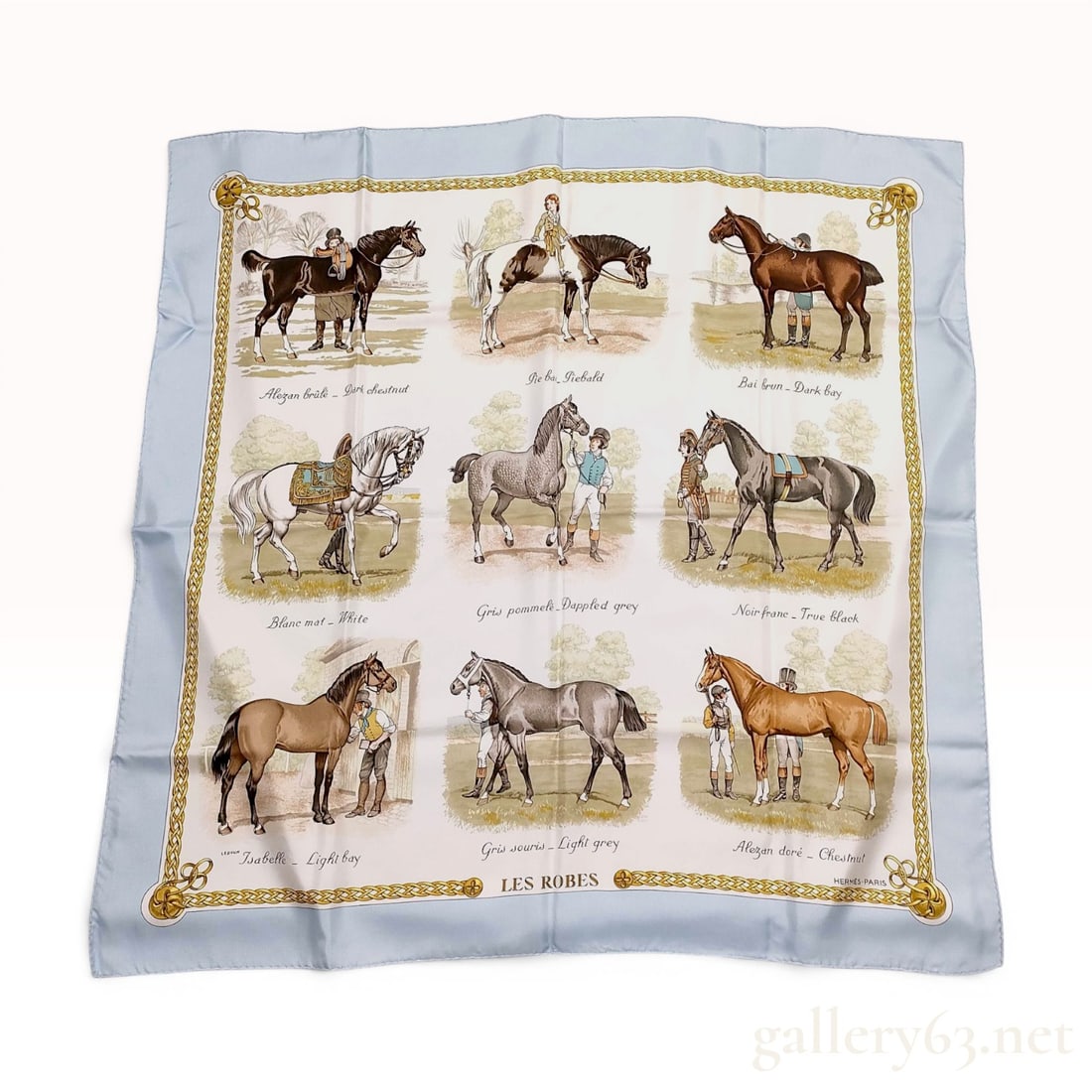 Hermes Les Robes Silk Scarf by Philippe Ledoux with Box: This authentic Hermes silk twill scarf, titled Les Robes, features a design by artist Philippe Ledoux first issued in 1971. The pattern consists of a cream central field decorated with nine individual