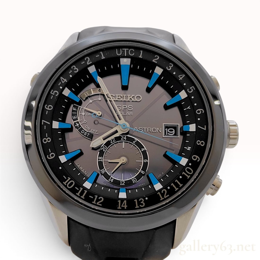 Seiko Astron GPS Solar Stainless Steel Watch SBXA009 7X52-0AB0: Seiko Astron GPS Solar wristwatch, reference SBXA009 (case reference 7X52-0AB0). This professional travelers timepiece features a stainless steel case with a black ceramic bezel and a gray sunburst di
