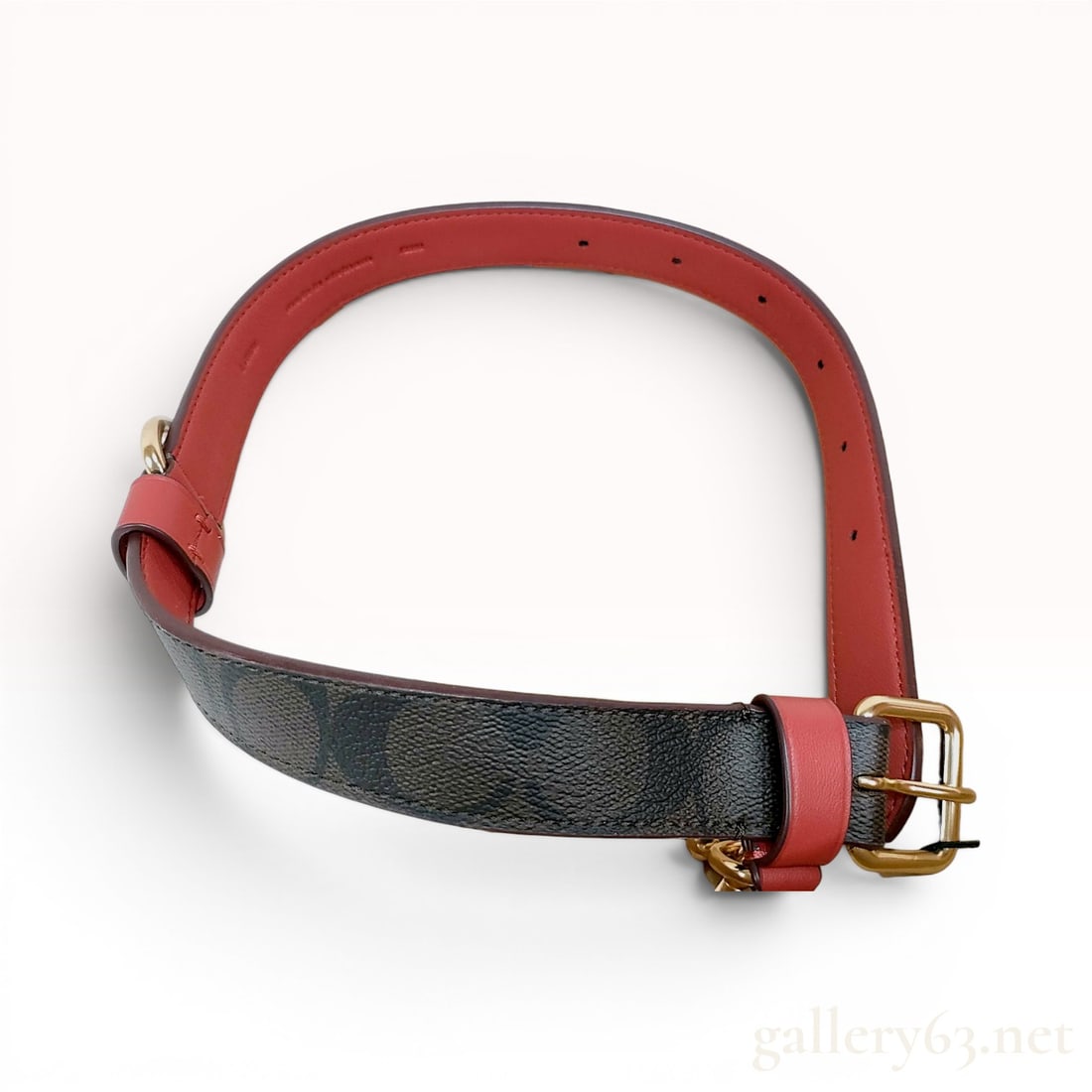 Coach Large Signature Canvas and Leather Pet Collar with Box: Coach designer pet collar crafted from brown signature C pattern coated canvas with a red leather lining. The collar features gold-tone metal hardware, including a buckle closure and a D-ring for leas