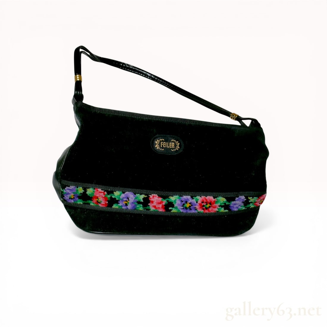 Feiler Chenille Floral Baguette-Style Shoulder Bag: Feiler baguette-style shoulder bag featuring a black chenille body accented by a multicolored floral embroidery band in shades of pink, purple, and green. The bag is constructed with a black textured 