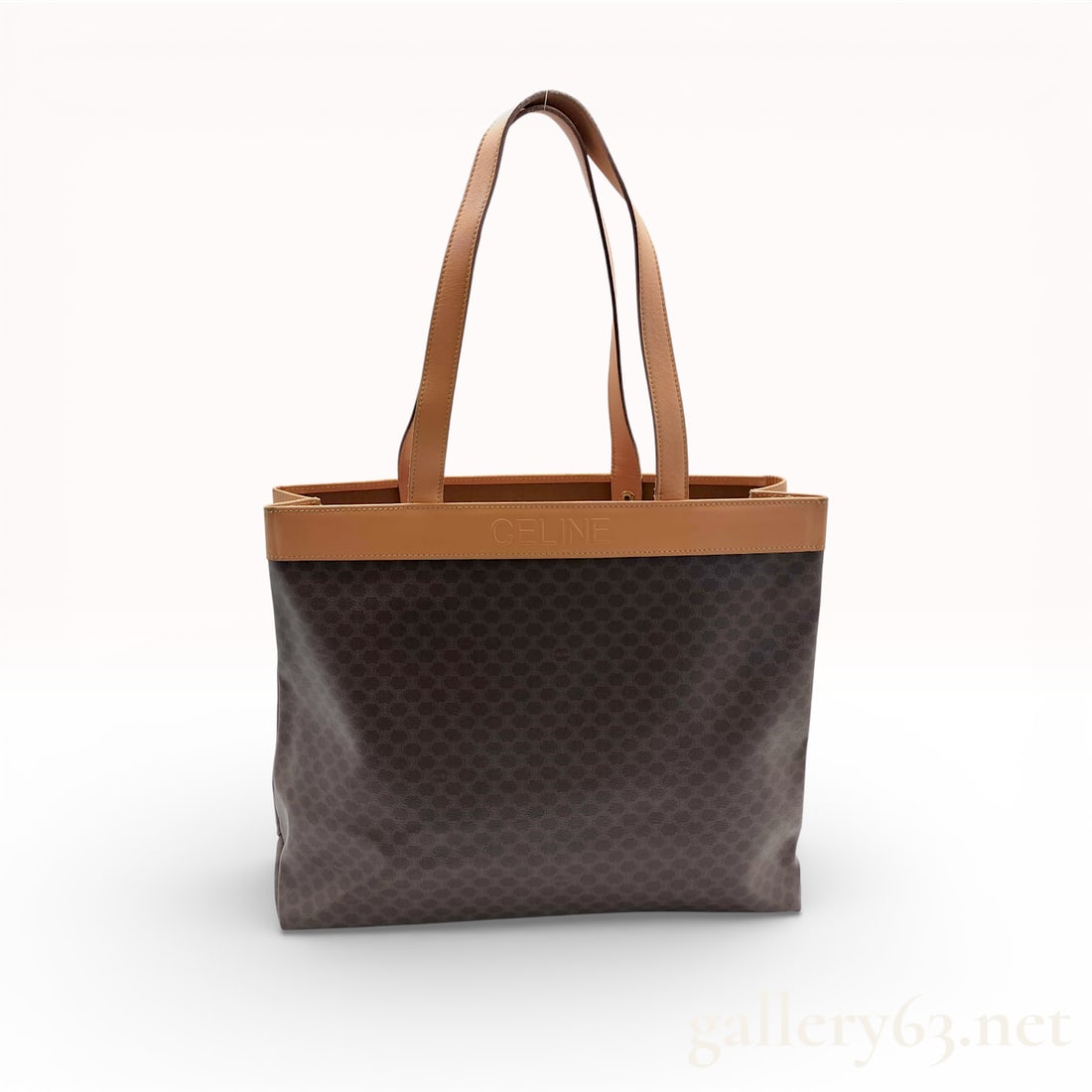Celine Vintage Macadam Tote Bag, Coated Canvas and Leather, Brown: Celine bag crafted from the brand's signature brown Macadam monogram coated canvas with tan leather trim and handles. The front leather band features a debossed CELINE logo. The interior is lined with