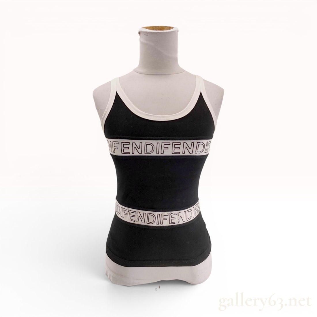 Fendi Jeans Vintage Black Cotton Blend Logo Band Tank Top: A vintage Fendi Jeans sleeveless tank top produced in Italy by Swinger International S.p. A. The garment is constructed from a black cotton and elastane blend with contrasting white rib-knit binding a