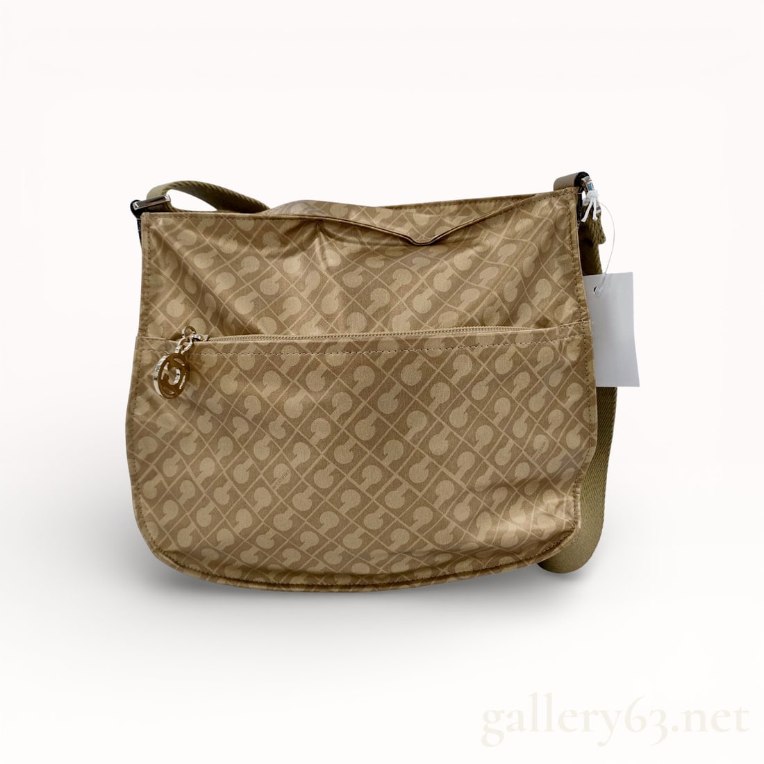 Gherardini GH0260 Softy Monogram Crossbody Bag: Gherardini GH0260 crossbody bag in the signature Softy coated fabric. The exterior features a champagne-tan monogram pattern, a front zippered pocket with a circular logo pull, and an adjustable webbe
