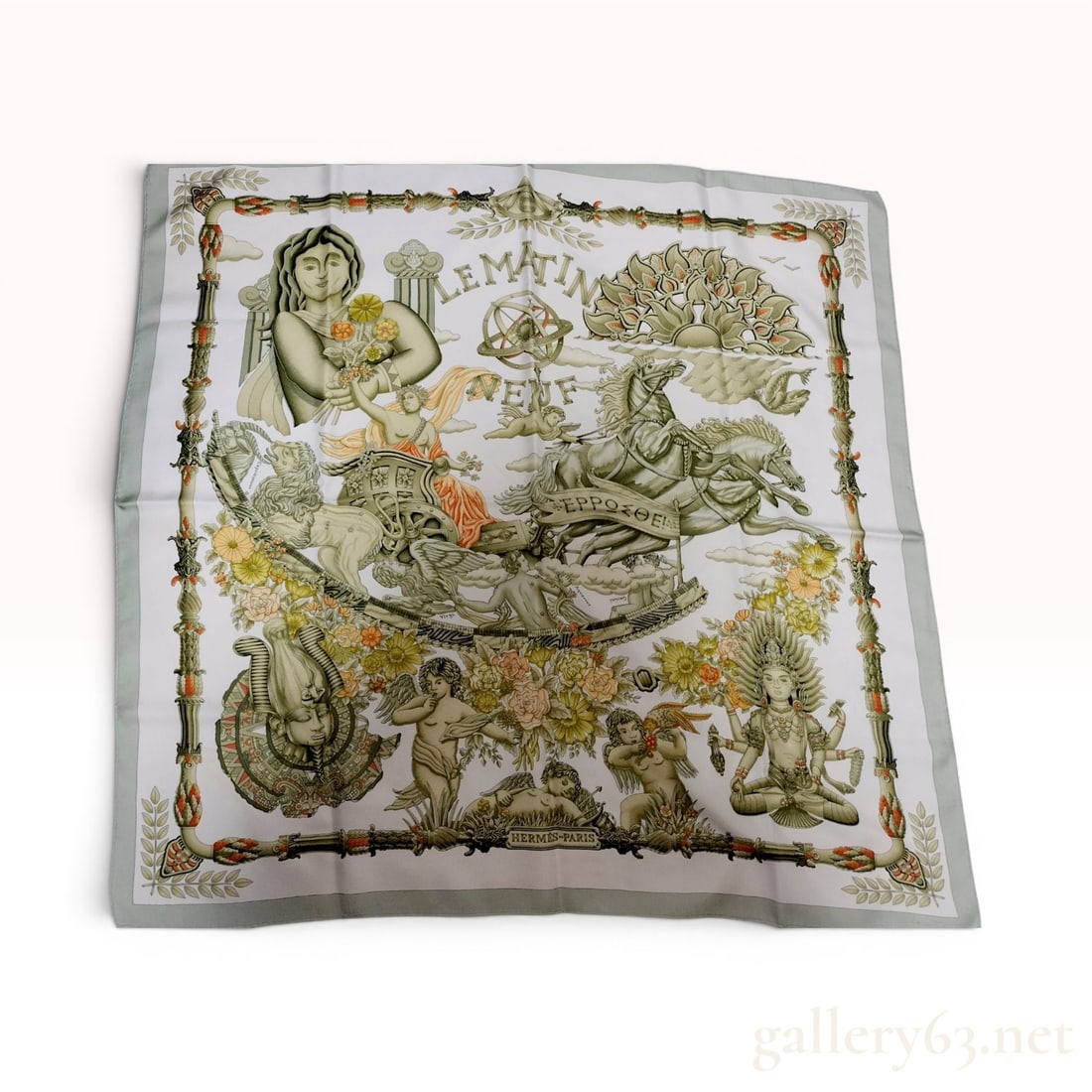 Hermes Le Matin Neuf Silk Twill Scarf: A 100% silk twill scarf from Hermes featuring the Le Matin Neuf (The New Morning) pattern designed by Caty Latham. The intricate design depicts an allegorical celestial chariot drawn by a quadriga of 