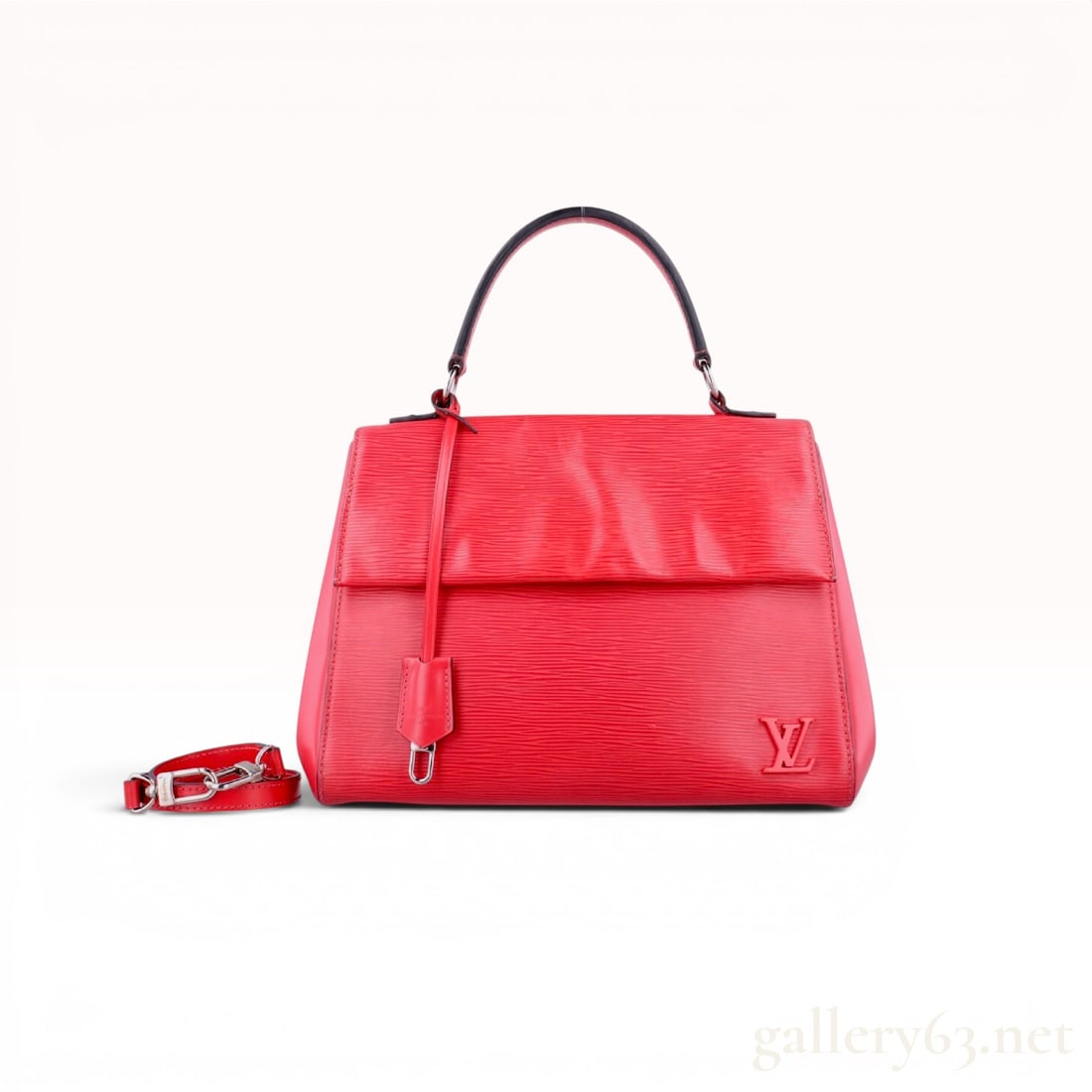 Louis Vuitton Epi Leather Cluny MM Handbag in Coquelicot: Louis Vuitton Cluny MM top handle bag crafted from red Coquelicot Epi leather, manufactured in Spain circa 2012. Features a structured silhouette with a fold-over magnetic flap, single rolled top hand