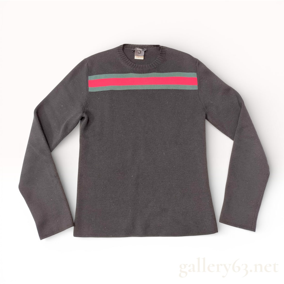 Gucci 131652 Dark Gray Knit Sweater with Green and Red Web Stripe: Gucci 131652 knit sweater featuring dark gray textured knit construction. Crew neckline having ribbed trim with long sleeves and straight hem. Upper chest featuring signature green and red Web stripe 