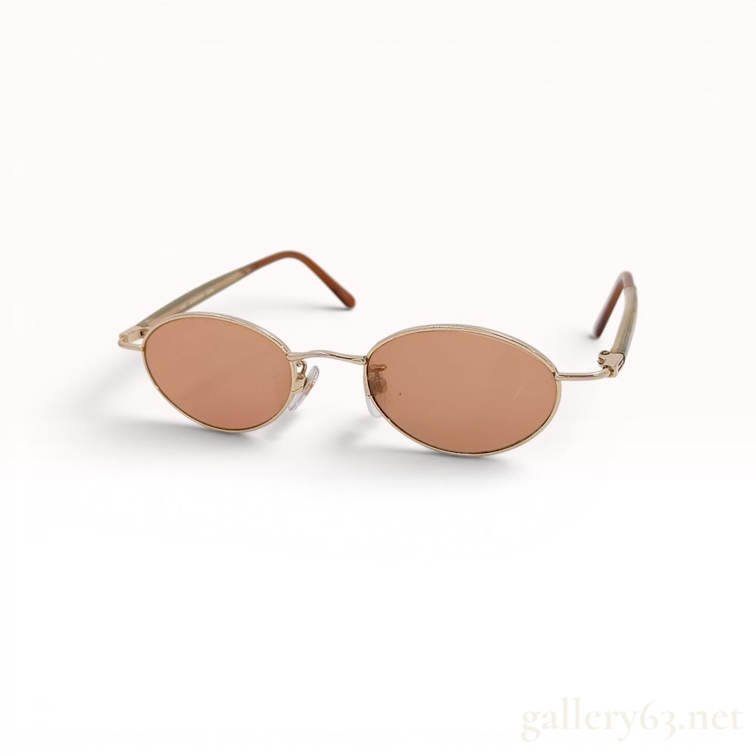 Etro ESG006 GPB Gold-Tone Metal Oval Sunglasses: Etro ESG006 GPB designer oval-frame sunglasses, made in Japan. Crafted with gold-tone metal frames featuring light brown tinted lenses and multicolor woven patterned temples finished with translucent 