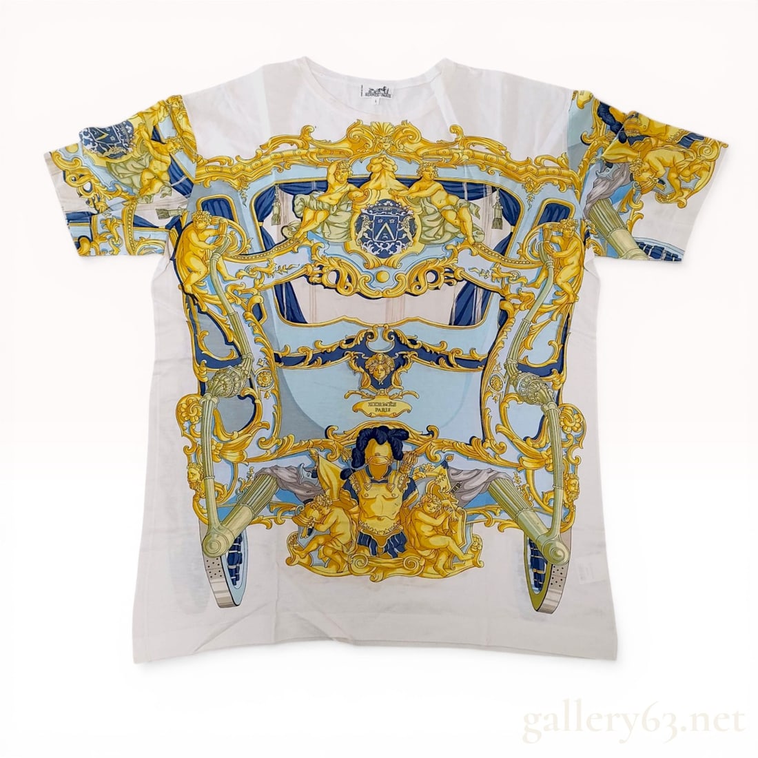 Hermes Ornate Carriage Graphic Print Cotton T-Shirt Size Large: Hermes short-sleeved cotton t-shirt featuring an intricate carriage graphic. The white crewneck garment is decorated with a multi-colored baroque-style print in gold, navy, and light blue depicting pu