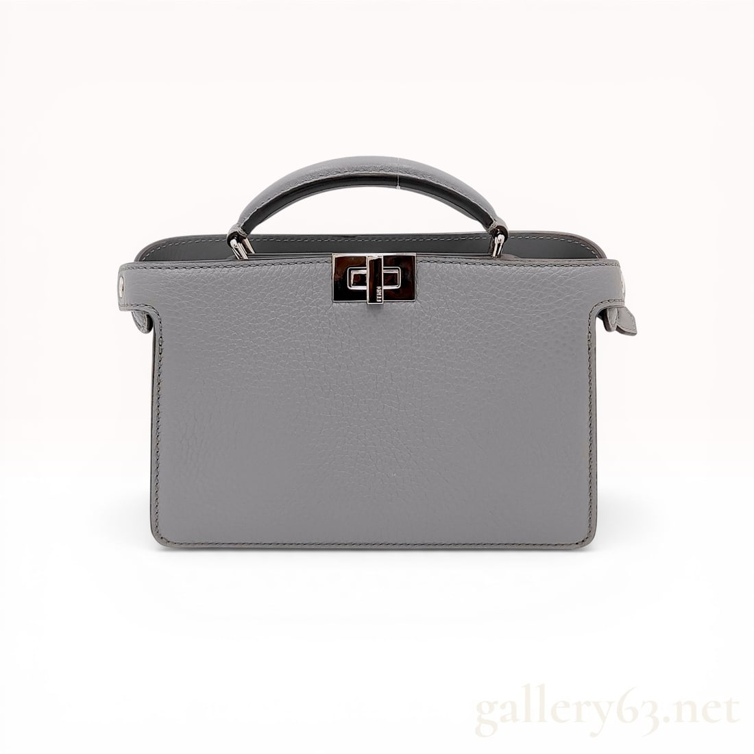 Fendi Grey Grained Leather Peekaboo ISeeU Mini Handbag: Fendi Peekaboo ISeeU Mini handbag in grey grained Cuoio Romano calfskin leather. The structured design features two main compartments separated by a stiff partition, each with a silver-tone turn-lock 